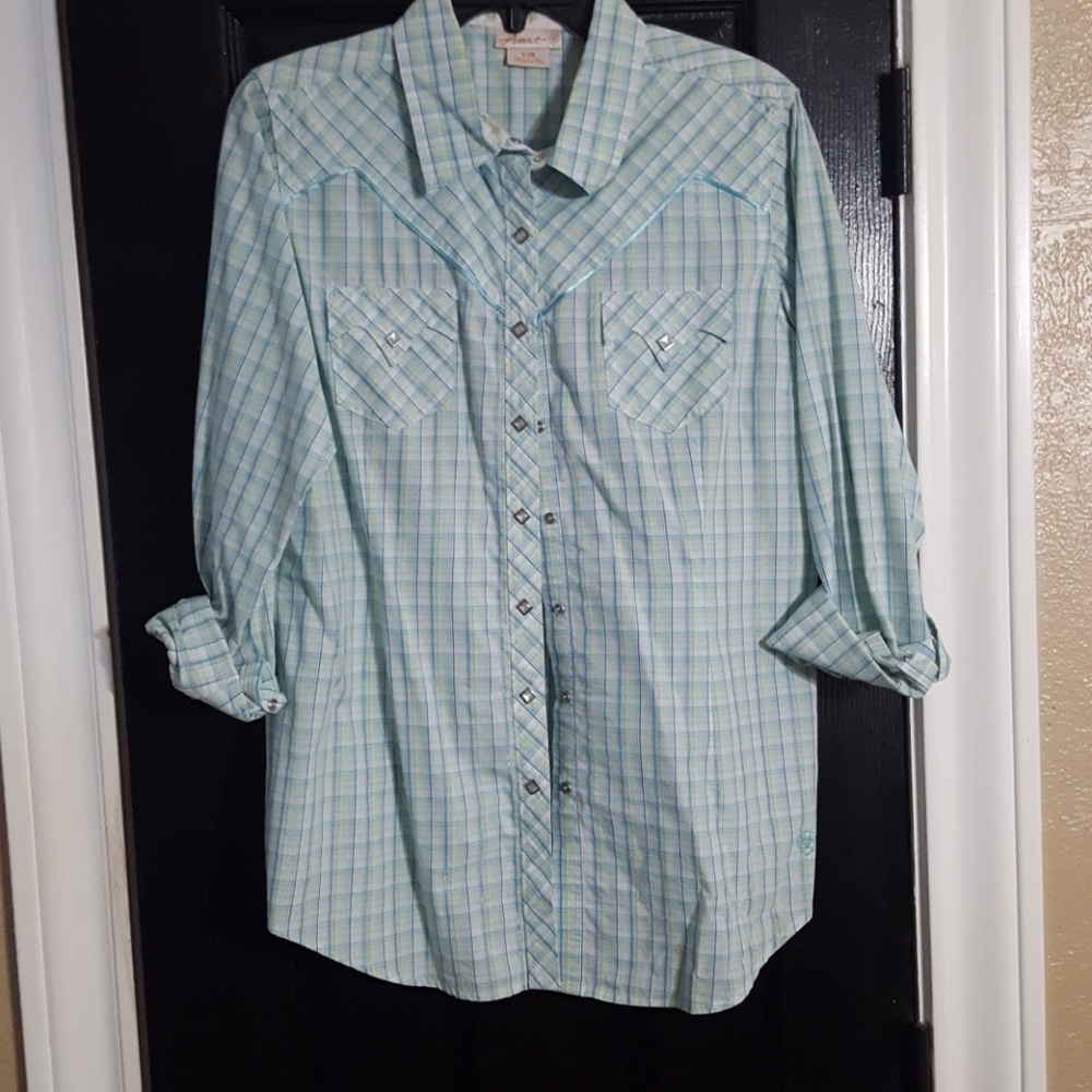 Ladies western blouse with pearl snaps.